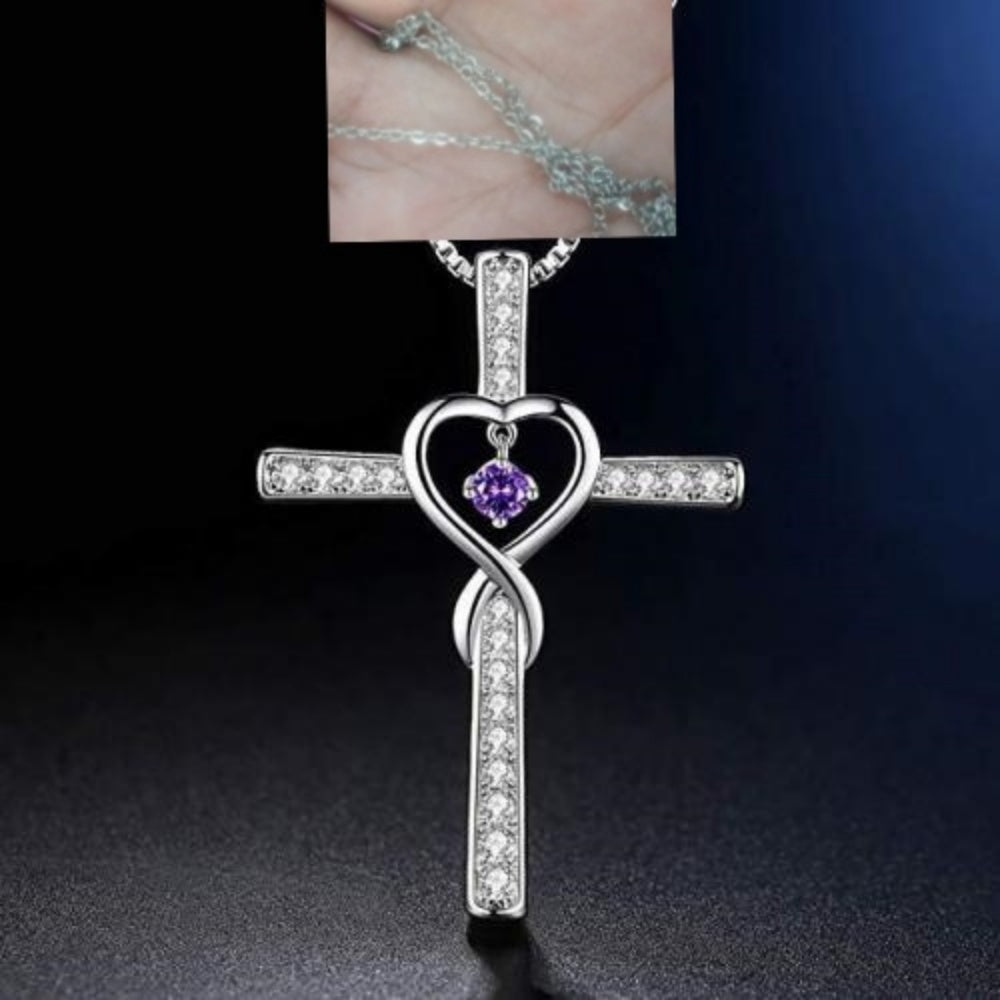 Christian cross necklace worn by model