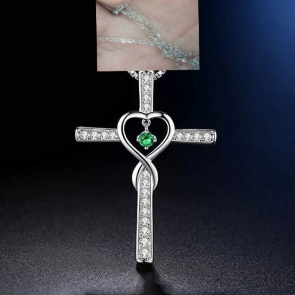Gold cross pendant necklace with coloured gems