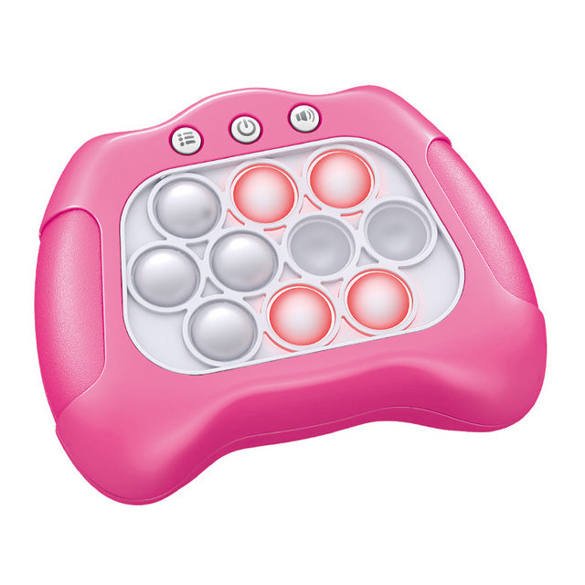 Pink electronic device with circular components on a white background