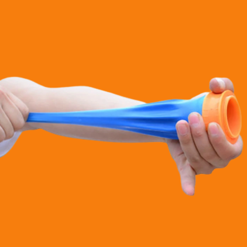 Hand holding a blue and orange water gun against an orange background