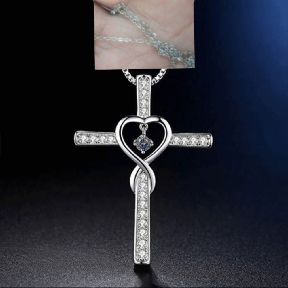 Christian cross necklace close-up with crystal detail